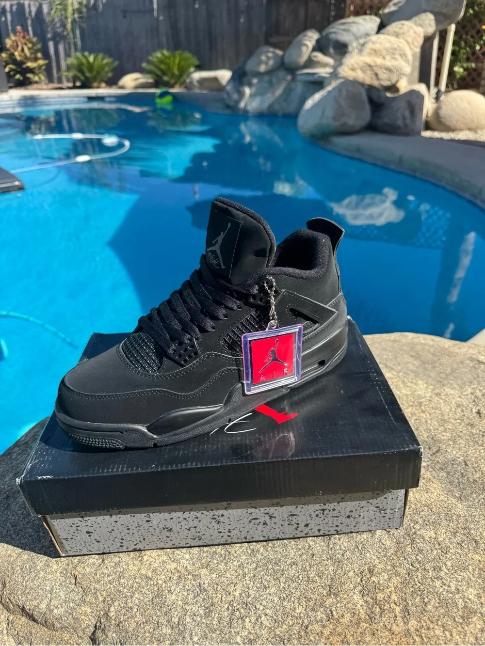 Jordan Men's Black Retro Sneakers with Subtle Red Accent